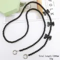 Crossbody black beaded phone lanyard with bows and spring hooks, 120cm length - Black Three Bows Acrylic