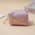 Pink glitter coin purse with colorful LOVE sequin embroidery and a gold keychain clasp - Purple