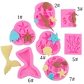 Set of 7 pink silicone fondant molds featuring sea shells, seahorses, and coral shapes - Pink 7-Piece Set
