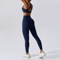 Set yoga blu scuro da donna con reggiseno incrociato e leggings effetto push-up - Blu distintivo-Completo leggings