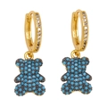 Detail of gold bear earrings with blue turquoise beads and micro-set zircon crystals - Turquoise