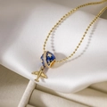 18K gold plated airplane and blue enamel globe pendant necklace on white silk background - Earth Airplane Star Style (24708)