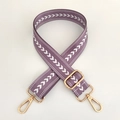Close-up of purple nylon strap with white arrow pattern and gold metal hardware - Light Purple Silver Buckle
