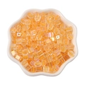 5mm orange colorful core glass cube beads in a white bowl for DIY jewelry making - 11g/Bag (Approx. 50pcs) / Dark Yellow
