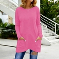 Pink long sleeve T-shirt with crew neck and practical side pockets in outdoor setting - S / Tops / Red