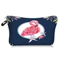 Detail of flamingo pattern on a navy polyester makeup bag with black zipper and handle - Dark Blue Flamingo
