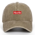 Detail of Hustle embroidery patch on khaki washed cotton vintage baseball cap - One Size / Khaki