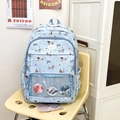 Blue dachshund pattern backpack with clear front pocket and decorative anime badges - Bag + Insert Board / Light Blue