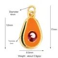 Miniature gold alloy avocado charm with orange and red enamel inlay for DIY jewelry - Avocado Shape (M157589)