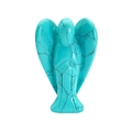 Natural turquoise crystal angel figurine with unique blue and black webbed patterns - Turquoise