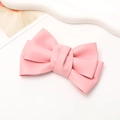 Detalle del lazo de cuero sintético rosa con superficie de textura suave - Rosa