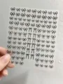 Elegant black bow nail art stickers featuring varied sizes on a transparent sheet - Aha-9301 Black Bows