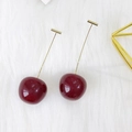 Long cherry earrings with deep red globes and gold stems on white faux fur background - Wine Red Cherry (WG3-0609)