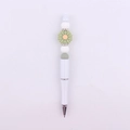 Detail view of DIY beaded pen with white plastic body and green daisy silicone charm - White & Green Daisy