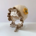 Knitted beige baby bonnet with brown ruffle edge and yellow sun flower detail - Beige Brown Edge Flower - Lined