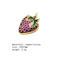 Macro detail of gold strawberry pendant with purple zircon and green enamel finish - Size 7