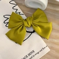 Yellow satin bow hair clip placed on a canvas bag, vintage style elegant hair accessory - Hair Tie / Ginger Yellow