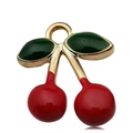 Enamel cherry charm with red fruit and green leaves in golden metal setting - Double Cherry 14x16mm