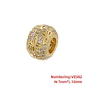 Detailed view of gold plated hollow flower charm with cubic zirconia, size 10mm x 7mm - Hollow Clover Style (VZ382) / 7x10mm / Gold