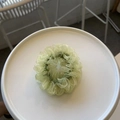 Light green ruffled mesh scrunchie hair tie displayed on a white ceramic plate - Mesh Scrunchie / Turquoise Green