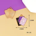Detail showing dimensions of 23mm by 23mm and a weight of 1.3g for the tarot charm - 4 Magic Book