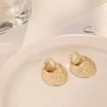 Exaggerated gold leaf earrings with hammered texture and vintage metallic finish - Golden Oval Hammered Earrings