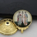Macro shot of golden religious icon handle featuring detailed embossed metal floral patterns - Gold-11 (Two Saints Portrait)