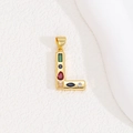 Detailed macro view of gold-plated L-letter pendant with vibrant colorful zircon stones - Letter L