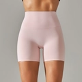 Detail of high-waisted pale pink yoga shorts with seamless elastic waistband and flat stitching - Light Pink