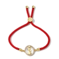 Detail of red braided string bracelet with gold Virgin Mary pendant and zircons - Oval Mother of Pearl Virgin Mary Pendant / Red