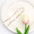Colorful beaded eyewear chain with pastel stars and butterflies on a decorative plate - Colorful Seed Bead Star Short Chain