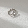 Minimalist silver hug ring with unique palm design on textured white background - Adjustable Open / White K/Silver