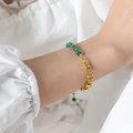 Gold chain bracelet with green malachite stone beads worn on female wrist - Natural Stone Bracelet (E497) / 18cm / Green