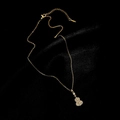 Elegant gold-plated necklace featuring a zircon-encrusted violin pendant on a black surface - 45# Xl1548-17 Violin