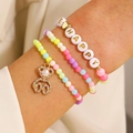 Set di tre bracciali di perle con lettere HAPPY dorate e ciondolo a forma di orso - Set da Tre Pezzi Pendaglio Orso Cuore Happy (2997)