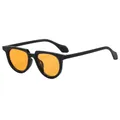 Fashionable black frame sunglasses with vibrant orange lenses in a vintage street style - Black Frame Orange Lens