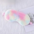 Rainbow plush sleep mask with pink satin elastic strap on white fluffy background - Plush Rainbow