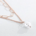 Collar de doble capa en oro rosa de acero de titanio con perla barroca blanca - Oro rosa