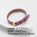 Detail view of purple leather bracelet with gold buckle and embossed texture 23cm length - Purple Leather Strap