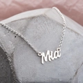 Custom silver nameplate necklace featuring Mia pendant on a sleek titanium chain - mia