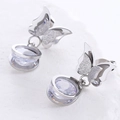 Elegantes pendientes de mariposa plateados con textura esmerilada y cristales de circón - Color Acero