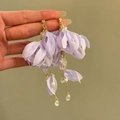 Detailed view of handmade purple fabric flower earrings with pearls and crystal beads - Silver Post Gold Flower Style / Light Purple