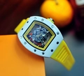 Detailed macro view of the white tonneau skeleton watch with yellow rubber strap - Skeleton Tonneau / White Case Yellow Strap