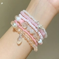Set di bracciali bohémien multistrato in perle rosa e bianche con ciondolo a stella marina - Bracciale Multistrato Rosa (14 Rosa WG-17)