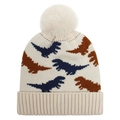 Detail of baby knitted hat showing navy and brown dinosaur jacquard patterns and yarn texture - Beige
