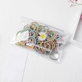 Colorful hair elastics for girls in daisy packaging on a white decorative table - 3cm Ribbed Light Colors