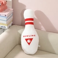 Plush bowling pin pillow in white with red stripes and bowling graphic on a beige sofa - Bowling Pin Style / 48cm(Approx 240g)