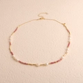 Detail view of Baroque pearls with pink mineral beads and gold-plated chain link necklace - Irregular Baroque Rhodonite Style