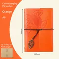 A6 orange PU leather refillable notebook with embossed leaf design and metal leaf pendant - Blank Kraft Paper / Orange / A6