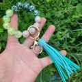 Luminous beads and turquoise leopard print bracelet keychain with a stylish leather tassel - Green Leopard